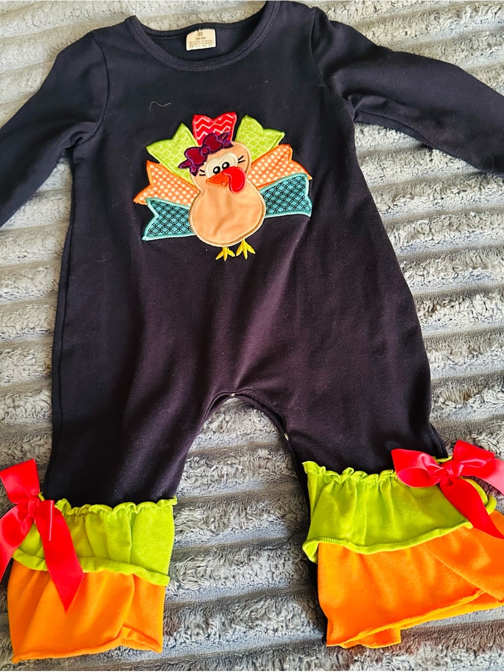 Black Turkey Appliqué Baby One-Piece with Orange & Lime Ruffles